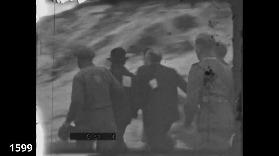 Screenshot from the Wiener Film mass execution in Liepaja 1942 fc 1599 - Jews are forced to run to the pit for execution
